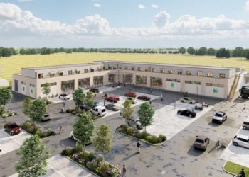 Unten Einkaufen, oben Wohnen: Richtfest für „Pötrauer Tor“